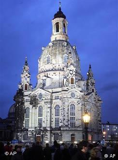 A crowd is gathered outside of the Frauenkirche in Dresden for its reopening in 2005
(AP Photo/Fabian Bimmer)