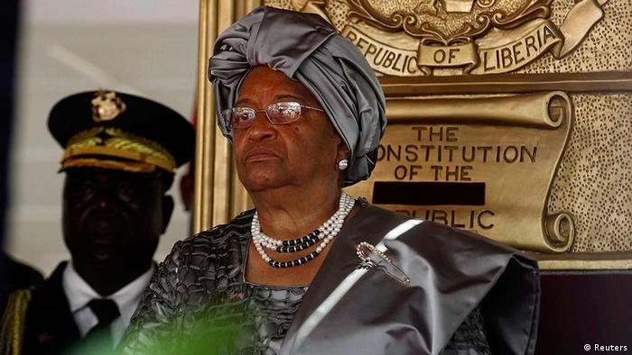 Liberian President Ellen Johnson-Sirleaf stands at a ceremony to mark her second presidential inauguration at the Capitol in Monrovia January 16, 2012. Johnson-Sirleaf is Africa's first woman president.         REUTERS/Larry Downing       (LIBERIA - Tags: POLITICS)