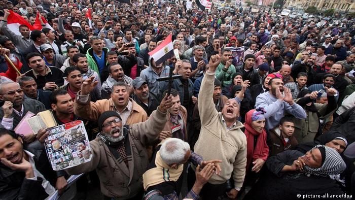 Egyptian protesters shouting  slogans at Tahrir Square