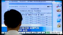 Man watching computer screen (Picture: Ahn Young-joon / AP)
