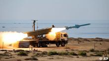 An Iranian missile is launched at the shore of sea of Oman