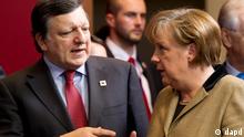 Angela Merkel and Jose Manuel Barroso talk at an EU summit in Brussels