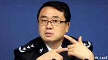In this Oct. 21, 2008 photo, Chongqing city police chief Wang Lijun reacts during a press conference in the southwestern China city. Wang, the country's most famous policeman, has dropped from sight amid unconfirmed reports of a political scandal and a bid for U.S. asylum. (AP Photo)  CHINA OUT