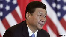 China's Vice President Xi Jinping smiles during a discussion with U.S. and Chinese business leaders at Beijing Hotel in Beijing, in this August 19, 2011 file photograph. A Communist "princeling" fond of small town America and Hollywood war dramas, and brusque critic of Western pressure with a daughter at Harvard, Chinese leader-in-waiting Xi Jinping embodies his nation's contradictory ties with the United States. Xi's visit to the United States next week will enhance his aura of readiness to lead China from late this year. It could also set the mood for the next decade that he is likely to serve as president, an era when Sino-U.S. relations face deep and potentially troublesome shifts. REUTERS/Lintao Zhang/Pool/Files (CHINA - Tags: POLITICS BUSINESS HEADSHOT)