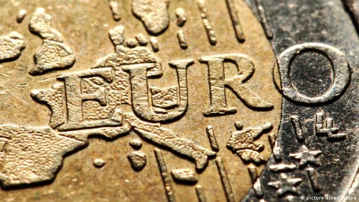 Монета с надписью Евро