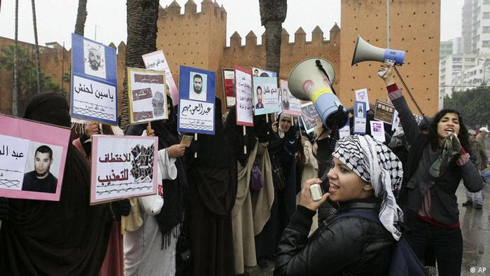 Two women activists shout slogan against the Moroccan government