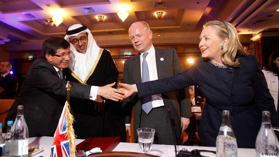 U.S. Secretary of State Hillary Clinton (R) meets with (L-R) Turkey's Foreign Minister Ahmet Davutoglu