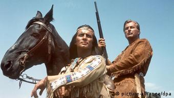 Actors Pierre Brice as Apache chief Winnetou and Lex Barker as Old Shatterhand in a scene from a Karly May film