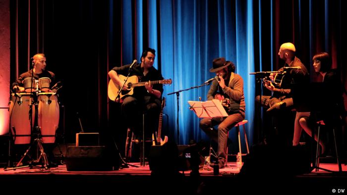 Iranian rapper and songwriter Shahin Najafi and his band
