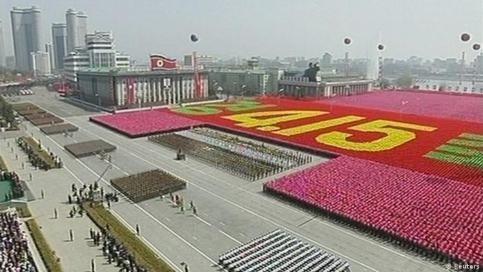 North Korean soldiers take part in a mass parade to celebrate founder Kim Il-sung's 100th birthday in Pyongyang in this still image taken from video April 15, 2012. North Korea's leader Kim Jong-un led celebrations on Sunday to mark the centenary of the birth of his grandfather, the founder of the world's only Stalinist monarchy, "Eternal President" Kim Il-sung. REUTERS/KRT via Reuters TV (NORTH KOREA - Tags: POLITICS MILITARY ANNIVERSARY) FOR EDITORIAL USE ONLY. NOT FOR SALE FOR MARKETING OR ADVERTISING CAMPAIGNS. THIS IMAGE HAS BEEN SUPPLIED BY A THIRD PARTY. IT IS DISTRIBUTED, EXACTLY AS RECEIVED BY REUTERS, AS A SERVICE TO CLIENTS. NORTH KOREA OUT. NO COMMERCIAL OR EDITORIAL SALES IN NORTH KOREA