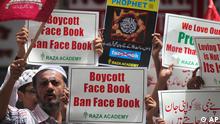 A Muslim protester shouts slogans as others hold placards during a protest against Facebook after prayers outside a mosque in Mumbai, India, Friday, May 21, 2010 (Photo: ddp images/AP Photo/Rafiq Maqbool)