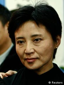 Gu Kailai, wife of China's former Chongqing Municipality Communist Party Secretary Bo Xilai, poses for a group photo at a mourning held for her father-in-law Bo Yibo, former vice-chairman of the Central Advisory Commission of the Communist Party of China, in Beijing in this January 17, 2007 file photo. Neil Heywood, the British businessman whose murder has sparked political upheaval in China was poisoned after he threatened to expose a plan by a Chinese leader's wife to move money abroad, two sources with knowledge of the police investigation said. Heywood had spent his last week in Chongqing in Nan'an district, an area politically loyal to Bo, and stayed at two hotels: the Nanshan Lijing Holiday Hotel and the Sheraton hotel. Picture taken January 17, 2007. REUTERS/Stringer/Files (CHINA - Tags: POLITICS CRIME LAW HEADSHOT BUSINESS) CHINA OUT. NO COMMERCIAL OR EDITORIAL SALES IN CHINA