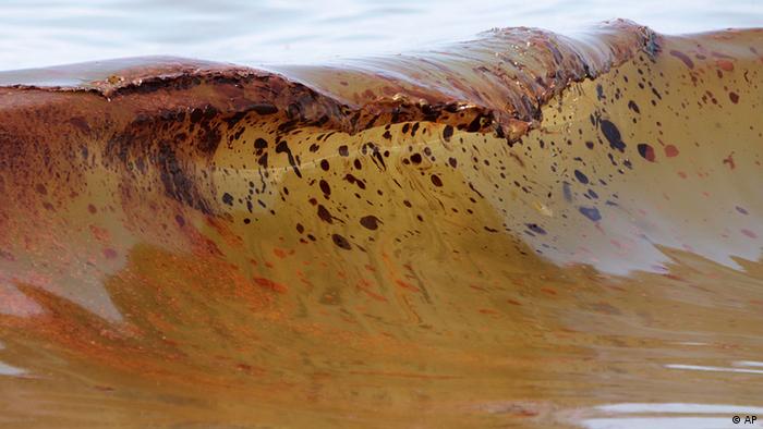 In a Saturday, June 12, 2010 file photo, crude oil from the Deepwater Horizon oil spill washes ashore in Orange Beach, Alabama in the US. (Photo via AP)