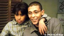 From the left Ahmed Osama an Egyptian artist with Hussin (14 years) street childern  
