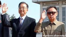 FILE - Chinese Premier Wen Jiabao (L) is greeted by North Korean leader Kim Jong-il (R) at Sunan Airport near Pyongyang, North Korea, 04 October 2009, after arriving on a three-day visit coinciding with the 60th anniversary of diplomatic relations between the two countries. North Korean leader Kim Jong Il, who isolated his country and brought it to the brink of economic ruin while leading one of the world_s largest armies and provoking international fears with a nuclear programme, has died, state media reported 19 December 2011. Kim died on 17 December 2011 of a heart attack brought on by 'great mental and physical strain' during a train journey, the North Korean Central News Agency KCNA said. EPA/YONHAP
