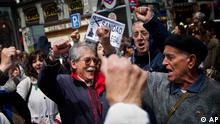 Demonstrators sing 'The Internationale' during Sunday's Madrid protest