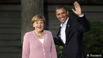U.S. President Barack Obama greets Germany's Chancellor Angela Merkel as she arrives at the G8 Summit at Camp David (eingestellt von: qu)