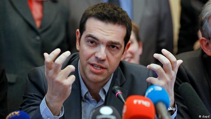 Greece's Left Coalition party leader Alexis Tsipras, addresses reporters during a press conference 