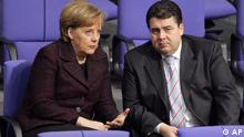 Chancellor Angela Merkel and Sigmar Gabriel of the opposition Social Democrats 
