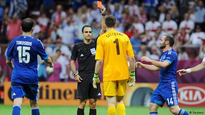 Source News Feed: EMEA Picture Service ,Germany Picture Service

Referee Carlos Velasco Carballo of Spain (2nd L) shows a red card to Poland's goalkeeper Wojciech Szczesny (2nd R) during their Group A Euro 2012 soccer match against Greece at the National stadium in Warsaw, June 8, 2012. REUTERS/Pawel Ulatowski (POLAND - Tags: SPORT SOCCER)