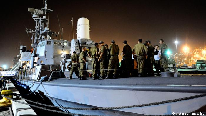 A photograph supplied by the Israeli Defense Forces (IDF) on 30 May 2010 shows Isralei sailors in the navy base in Haifa as they prepare to set sail into the Mediterranean Sea on 29 May 2010 in order to track and intercept the Free Gaza Movement flotilla. Israel has said it considers the flotilla of ships and with some 800 activists on board to be a provocation and will seize the ships and deport the activists if they enter into Gaza Strip waters. EPA/IDF SPOKESMANS OFFICE EDITORIAL USE ONLY / NO SALES