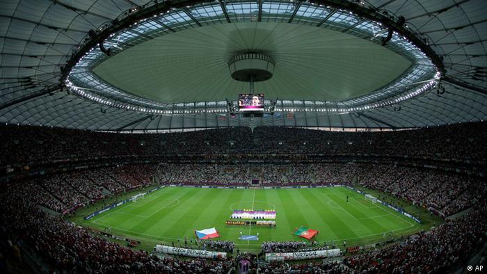 The teams line up as the national anthems play prior to the Euro 2012 soccer championship quarterfinal match between Czech Republic and Portugal in Warsaw, Poland, Thursday, June 21, 2012. (AP Photo/Gero Breloer)