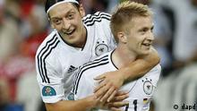 Germany's Marco Reus and Mesut Oezil celebrate their team's fourth goal during the Euro 2012 soccer championship quarterfinal match between Germany and Greece in Gdansk, Poland, Friday, June 22, 2012. (Foto:Thanassis Stavrakis/AP/dapd)/ eingest. SC