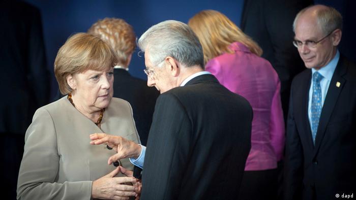 Germany's Merkel and Italian premier Mario Monti at the EU summit