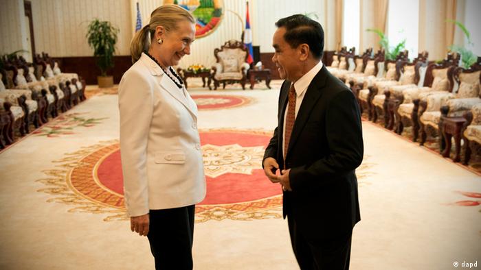 U.S. Secretary of State Hillary Rodham Clinton and Laotian Prime Minister Thongsing Thammavong talk before a meeting at the Prime Minister's Office Affairs in Vientiane, Laos Wednesday, July 11, 2012. Clinton became the first U.S. secretary of state to visit Laos in more than five decades, gauging whether a place the United States pummeled with bombs during the Vietnam War could evolve into a new foothold of American influence in Asia. (AP Photo/Brendan Smialowski, Pool)