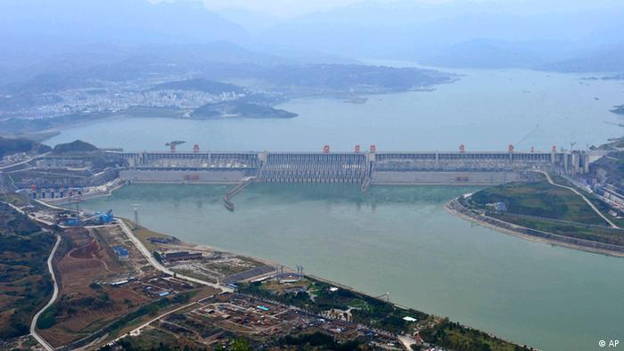 FILE - This Oct. 26, 2010 file photo released by China's Xinhua News Agency shows the reservoir of the Three Gorges Dam in Yichang, in central China's Hubei province. China has admitted that its showcase Three Gorges Dam, the world's largest hydroelectric project, has caused a slew of urgent environmental, geologic and economic problems. (AP Photo/Xinhua, Du Huaju, File) NO SALES