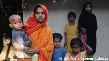 Parveen Akhtar, an illegal Rohingya refugee woman and her children