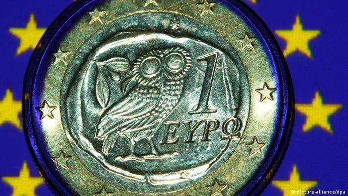 A Greek euro coin on a European flag
Photo: Jens Büttner dpa/lmv