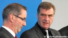 Brandenburg Finance Minister Ralf Christoffers and Governor Matthias Platzeck