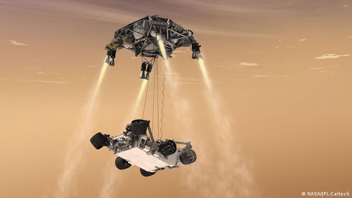 Curiosity's Sky Crane Maneuver, Artist's Concept

This artist's concept shows the sky crane maneuver during the descent of NASA's Curiosity rover to the Martian surface.

The entry, descent, and landing (EDL) phase of the Mars Science Laboratory mission begins when the spacecraft reaches the Martian atmosphere, about 81 miles (131 kilometers) above the surface of the Gale crater landing area, and ends with the rover Curiosity safe and sound on the surface of Mars.

Entry, descent, and landing for the Mars Science Laboratory mission will include a combination of technologies inherited from past NASA Mars missions, as well as exciting new technologies. Instead of the familiar airbag landing systems of the past Mars missions, Mars Science Laboratory will use a guided entry and a sky crane touchdown system to land the hyper-capable, massive rover.

The sheer size of the Mars Science Laboratory rover (over one ton, or 900 kilograms) would preclude it from taking advantage of an airbag-assisted landing. Instead, the Mars Science Laboratory will use the sky crane touchdown system, which will be capable of delivering a much larger rover onto the surface. It will place the rover on its wheels, ready to begin its mission after thorough post-landing checkouts.

The new entry, descent and landing architecture, with its use of guided entry, will allow for more precision. Where the Mars Exploration Rovers could have landed anywhere within their respective 93-mile by 12-mile (150 by 20 kilometer) landing ellipses, Mars Science Laboratory will land within a 12-mile (20-kilometer) ellipse! This high-precision delivery will open up more areas of Mars for exploration and potentially allow scientists to roam "virtually" where they have not been able to before.

In the depicted scene, the spacecraft's descent stage, while controlling its own rate of descent with four of its eight throttle-controllable rocket engines, has begun lowering Curiosity on a bridle. The rover is connected to the descent stage by three nylon tethers and by an umbilical providing a power and communication connection. The bridle will extend to full length, about 25 feet (7.5 meters), as the descent stage continues descending. Seconds later, when touchdown is detected, the bridle is cut at the rover end, and the descent stage flies off to stay clear of the landing site.

The Mars Science Laboratory spacecraft is being prepared for launch during Nov. 25 to Dec. 18, 2011. Landing on Mars is in early August 2012. In a prime mission lasting one Martian year (nearly two Earth years) researchers will use the rover's tools to study whether the landing region has had environmental conditions favorable for supporting microbial life and for preserving clues about whether life existed.

NASA's Jet Propulsion Laboratory, a division of the California Institute of Technology, Pasadena, Calif., manages the Mars Science Laboratory Project for the NASA Science Mission Directorate, Washington.

More information about Curiosity is at http://www.nasa.gov/msl and http://mars.jpl.nasa.gov/msl/ .

Image credit: NASA/JPL-Caltech