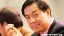 --FILE--Bo Xilai, then Governor of Liaoning province and son of former Chinese Vice Premier Bo Yibo, attends the China Entrepreneur Summit 2003 in Beijing, China, 6 December 2003. Chinas Communist Party has suspended former high-flying politician Bo Xilai from its top ranks and named his wife a suspect in the murder of a British businessman, a dramatic turn in a scandal shaking leadership succession plans. The decision to banish Bo from the Central Committee and its Politburo effectively ends the career of Chinas brashest and most controversial politician, widely seen as pressing for a top post in Chinas next leadership to be settled later this year. The official Xinhua news agency confirmed on Tuesday (10 April 2012) that Bo had been suspended from his party posts, and separately reported that his wife, Gu Kailai, was suspected in the murder of Briton Neil Heywood.