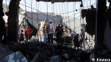 Men search for bodies under rubble of a house, destroyed by a Syrian Air force air strike

REUTERS/Goran Tomasevic