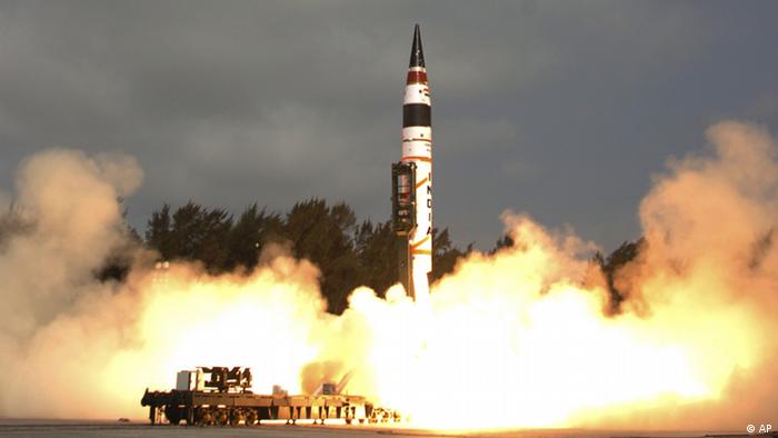  In this photo released by Indian Ministry of Defense, India’s Agni-V missile, with a range of 5,000 kilometers (3,100 miles), lifts off from the launch pad at Wheeler Island off India's east coast, Thursday, April 19, 2012. India announced Thursday that it had successfully test launched a new nuclear-capable missile that would give it, for the first time, the capability of striking the major Chinese cities of Beijing and Shanghai. (Photo:Indian Ministry of Defense/AP/dapd) 