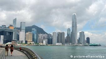 Panoramic view of the Victoria Harbor and skyscrapers and high-rise buildings in Central, Hong Kong, China, 27 June 2012. Chinas State Council, or the Cabinet, announced in late June measures aimed at boosting Hong Kongs anemic economic growth. The Cabinet said it will promote Hong Kongs status as a center for offshore finance using the mainlands tightly controlled currency, the yuan. It promised to encourage closer trade, education, science and technology, tourism and investment links.