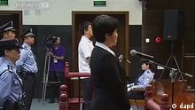 This video image taken from CCTV shows Gu Kailai, the wife of disgraced politician Bo Xilai, speaks in the dock at Hefei Intermediate People's Court in the eastern Chinese city of Hefei. Photo:CCTV via APTN/AP/dapd