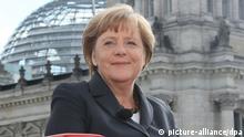 Angela Merkel stands outside in Berlin

Stephanie Pilick dpa

