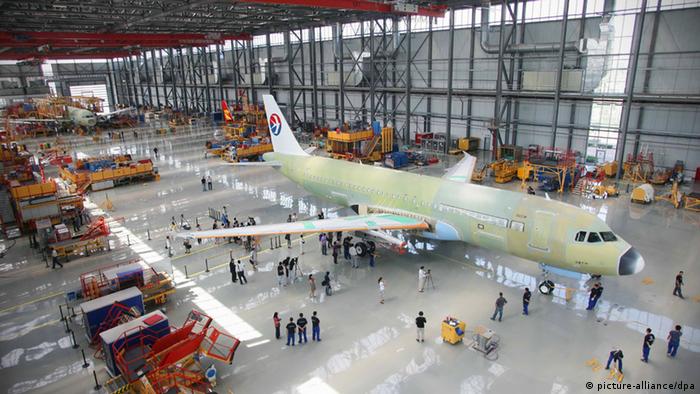 An Airbus A320, ordered by China Eastern, is seen on the assembly line at a plant of Airbus (Tianjin) Final Assembly Company Ltd. in Tianjin, China, Tuesday, 23 June 2009. Airbus SAS, the worlds largest commercial planemaker, rolled out the first aircraft assembled on Tuesday (June 23, 2009) at its China factory as it seeks to win more orders in the worlds second-largest aviation market. The planemaker aims to deliver 10 more A320s this year from its factory in Tianjin, it said in a statement. Production at the plant, Airbuss first outside Europe, will be raised to four aircraft a month by the end of 2011. Photo: Imaginechina/Bao fan +++(c) dpa - Report+++