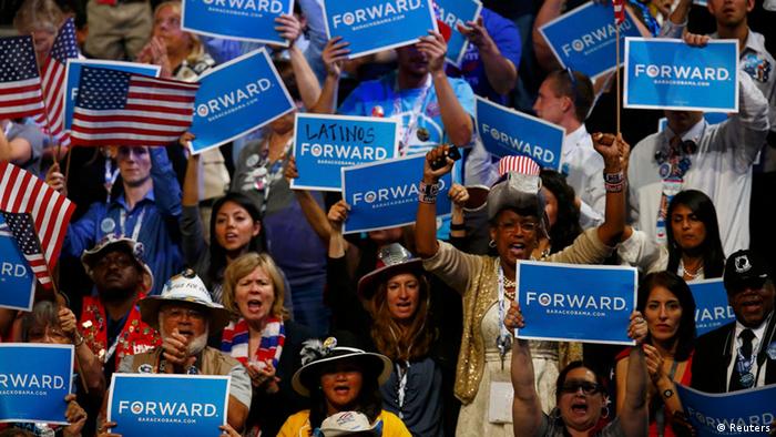 Delegates cheer as U.S. President Barack Obama addresses the final session of the Democratic National Convention in Charlotte, North Carolina September 6, 2012. REUTERS/Chris Keane (UNITED STATES  - Tags: POLITICS ELECTIONS)