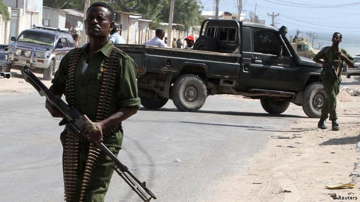 Somali soldiers patrol the scene of an explosion in  Mogadishu
REUTERS/Omar Faruk 