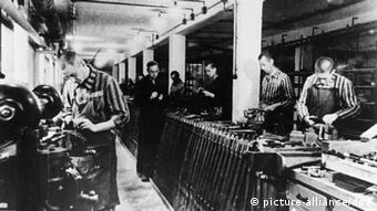 Prisoners in Dachau producing weapons