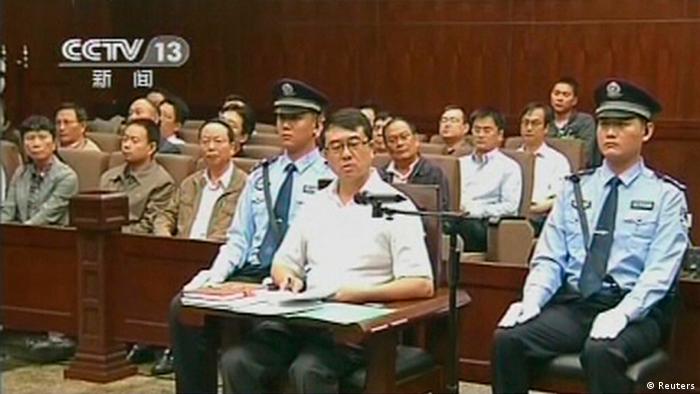 Former police chief Wang Lijun speaks during a court hearing in Chengdu in this still image taken from video September 18, 2012. The former police chief at the heart of China's biggest political uproar in decades did not contest charges against him at his court hearing on Tuesday, an official said. Wang fled to a U.S. consulate in Chengdu for more than 24 hours in February, days after his dismissal as police chief of Chongqing, the nearby municipality then run by ambitious politician Bo Xilai, who had raised Wang to prominence as a crime gang-buster. REUTERS/CCTV via Reuters TV (CHINA - Tags: CRIME LAW POLITICS) FOR EDITORIAL USE ONLY. NOT FOR SALE FOR MARKETING OR ADVERTISING CAMPAIGNS. CHINA OUT. NO COMMERCIAL OR EDITORIAL SALES IN CHINA