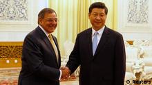 U.S. Secretary of Defense Leon Panetta (L) shakes hands with China's Vice President Xi Jinping before a meeting at the Great Hall of the People in Beijing, September 19, 2012. Panetta is on the second official stop of a three-nation tour to Japan, China and New Zealand. REUTERS/Larry Downing (CHINA - Tags: POLITICS MILITARY)
