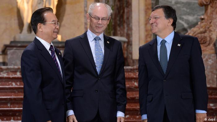 Chinese Premier Wen Jiabao, left, speaks with European Commission President Jose Manuel Barroso, right, and European Council President Herman Van Rompuy during an EU-China summit in Brussels on Thursday, Sept. 20, 2012. (AP Photo/John Thys, Pool)