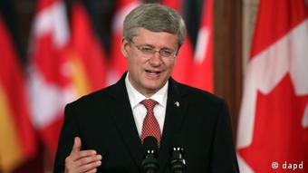 Canadian Prime Minister Stephen Harper speaks at a joint press conference with German Chancellor Angela Merkel on Parliament Hill in Ottawa, Canada, Thursday, Aug. 16, 2012. (AP Photo/The Canadian Press,Patrick Doyle)