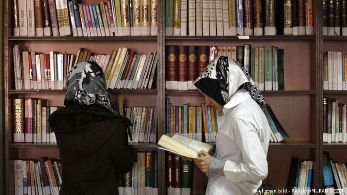 Turkish girls read books at the library at the Kazim Karabekir Girls' Imam-Hatip School in Istanbul February 10, 2010. The imam-hatip network is a far cry from the western stereotype of the madrassa as an institution that teaches the Koran by rote and little else