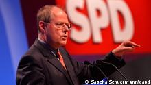 Steinbrück gestures during a speech with the SPD logo in the background
Photo: Sascha Schuermann/dapd.
